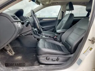 2014 Volkswagen Passat SE z VIN 1VWBN7A38EC076113, wystawiony jako Copart lot #64878365 z przebiegiem 162 833 mil mil oraz Czysty tytuł • Clean title. Historia ofert i sprzedaży dostępna na DreamBid. Obrazek 7.