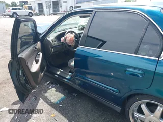 1997 Honda Civic LX z VIN 2HGEJ6671VH574878, wystawiony jako IAAI lot #42332735 z przebiegiem 246 181 mil mil oraz . Historia ofert i sprzedaży dostępna na DreamBid. Obrazek 14.