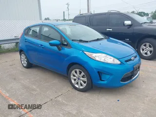 2012 Ford Fiesta SE z VIN 3FADP4EJ0CM216346, wystawiony jako IAAI lot #42471730 z przebiegiem 165 615 mil mil oraz . Historia ofert i sprzedaży dostępna na DreamBid. Obrazek 1.