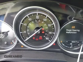 2020 Mazda CX-5 Touring with VIN JM3KFACM9L0771919, listed as a IAAI auction lot 41527773 with 93,417 mi miles and . Bid and sale history available at DreamBid. Image 7.