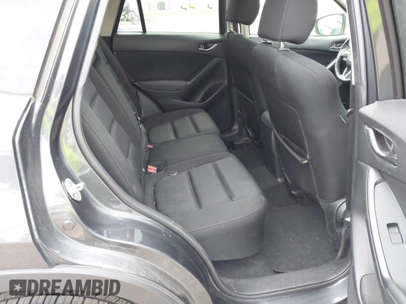 2014 Mazda CX-5 Touring with VIN JM3KE2CYXE0332517, listed as a IAAI auction lot 42109592 with 138,214 mi miles. Bid and sale history available at carsss.com. Image 8.