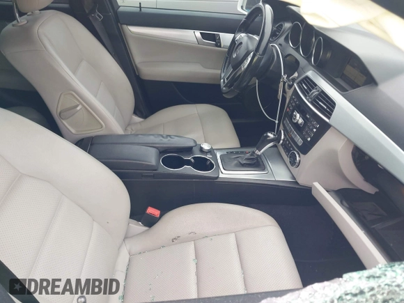 2014 Mercedes-Benz C-Class C 250 Sport with VIN WDDGF4HB9EA945465, listed as a IAAI auction lot 42035693 with 146,809 mi miles. Bid and sale history available at carsss.com. Image 5.