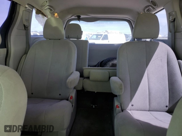 2012 Toyota Sienna with VIN 5TDKA3DC1CS012509, listed as a Copart auction lot 49906955 with 141,745 mi miles and Salvage Title. Bid and sale history available at DreamBid. Image 10.