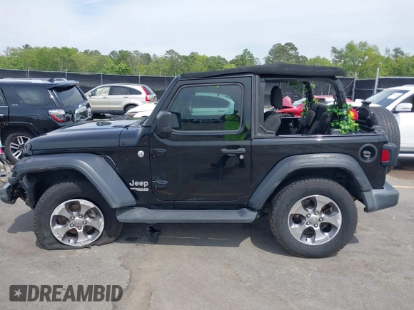 2018 Jeep Wrangler Sport S with VIN 1C4GJXAN8JW290064, listed as a IAAI auction lot 42012484 with 93,838 mi miles and . Bid and sale history available at DreamBid. Image 14.