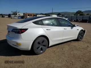 2023 Tesla Model 3 with VIN 5YJ3E1EA6PF423070, listed as a Copart auction lot 52029985 with 19,541 mi miles and Salvage Title. Bid and sale history available at DreamBid. Image 3.
