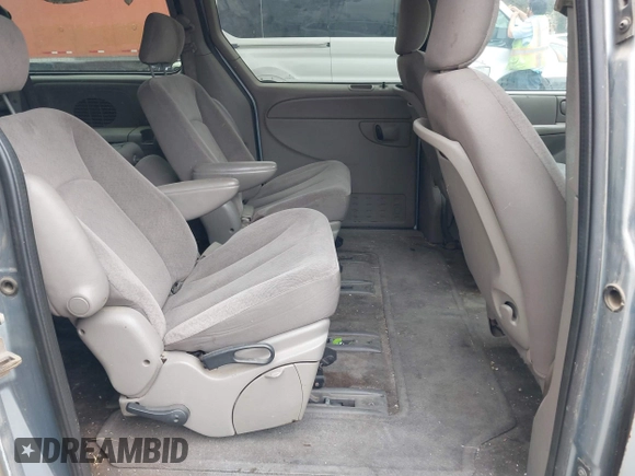 2003 Dodge Grand Caravan with VIN 1D4GP44383B252581, listed as a IAAI auction lot 41838754 with 164,773 mi miles and . Bid and sale history available at DreamBid. Image 8.