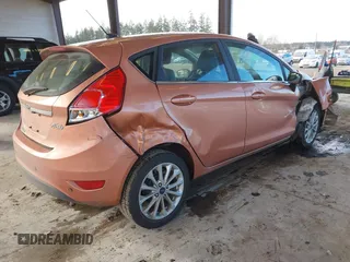 2017 Ford Fiesta Titanium with VIN 3FADP4FJ6HM139455, listed as a IAAI auction lot 41533050 with 104,788 mi miles and . Bid and sale history available at DreamBid. Image 4.
