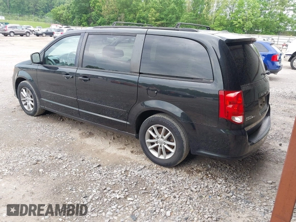 2013 Dodge Grand Caravan SXT with VIN 2C4RDGCG9DR599814, listed as a IAAI auction lot 42168424 with 173,413 mi miles and . Bid and sale history available at DreamBid. Image 3.