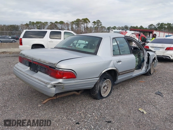 1997 Mercury Grand Marquis LS with VIN 2MELM75W2VX734069, listed as a IAAI auction lot 41405834 with Not Provided miles and . Bid and sale history available at DreamBid. Image 4.