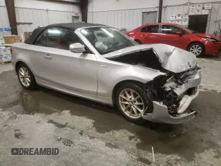 2011 BMW 1 Series 128i with VIN WBAUL7C52BVM80814, listed as a Copart auction lot 45150975 with 186,716 mi miles and Salvage title. Bid and sale history available at DreamBid. Image 4.