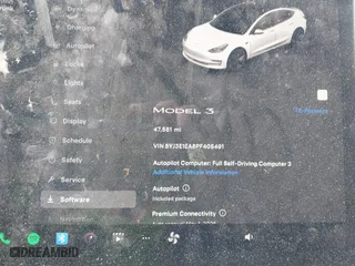 2023 Tesla Model 3 with VIN 5YJ3E1EA6PF405491, listed as a IAAI auction lot 41851797 with 47,581 mi miles. Bid and sale history available at carsss.com. Image 7.