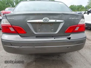2003 Toyota Avalon XL with VIN 4T1BF28B53U285411, listed as a IAAI auction lot 42140722 with 282,407 mi miles and . Bid and sale history available at carsss.com. Image 6.