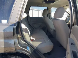 2006 Jeep Grand Cherokee Laredo with VIN 1J4GR48K56C326847, listed as a IAAI auction lot 41972623 with 141,088 mi miles. Bid and sale history available at carsss.com. Image 8.