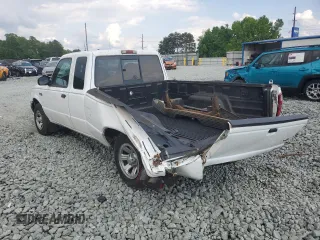 2002 Ford Ranger XL Fleet with VIN 1FTYR44U42TA55243, listed as a Copart auction lot 57310015 with 135,974 mi miles and Salvage title. Bid and sale history available at DreamBid. Image 2.