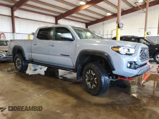 2020 Toyota Tacoma SR5 with VIN 3TMDZ5BN0LM091107, listed as a Copart auction lot 57582235 with 39,331 mi miles and Salvage title. Bid and sale history available at DreamBid. Image 4.