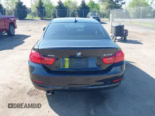 2015 BMW 4 Series 428i xDrive with VIN WBA3N9C59FK248249, listed as a IAAI auction lot 42140141 with 106,916 mi miles and . Bid and sale history available at DreamBid. Image 16.