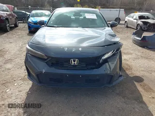 2025 Honda Civic Sport z VIN 2HGFE2F5XSH561073, wystawiony jako IAAI lot #41979103 z przebiegiem 1819 mil mil oraz . Historia ofert i sprzedaży dostępna na DreamBid. Obrazek 13.