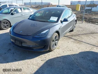 2023 Tesla Model 3 with VIN 5YJ3E1EA3PF678825, listed as a IAAI auction lot 41283153 with 8,607 mi miles. Bid and sale history available at carsss.com. Image 19.