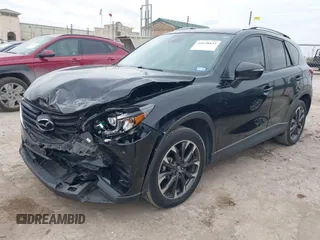 2016 Mazda CX-5 Grand Touring with VIN JM3KE2DY0G0651300, listed as a IAAI auction lot 41678833 with 98,790 mi miles. Bid and sale history available at carsss.com. Image 17.