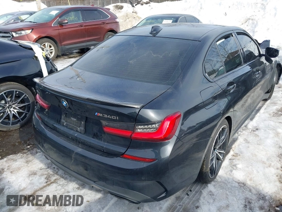 2021 BMW 3 Series M340i xDrive with VIN 3MW5U9J0XM8C19747, listed as a IAAI auction lot 41660591 with Not Provided miles. Bid and sale history available at carsss.com. Image 4.