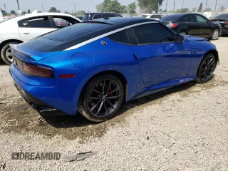 2023 Nissan Z Performance z VIN JN1BZ4BH4PM312028, wystawiony jako Copart lot #69381994 z przebiegiem 7788 mil mil oraz Szkody całkowita. Historia ofert i sprzedaży dostępna na DreamBid. Obrazek 3.