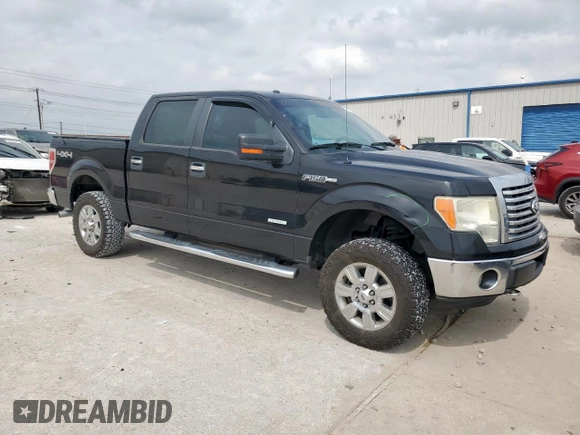 2012 Ford F-150 XL with VIN 1FTFW1ETXCFB32623, listed as a Copart auction lot 54597435 with 210,722 mi miles and Salvage Title. Bid and sale history available at DreamBid. Image 4.