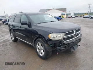 2011 Dodge Durango Express with VIN 1D4RE2GG5BC624209, listed as a IAAI auction lot 41978116 with 164,009 mi miles. Bid and sale history available at carsss.com. Image 1.