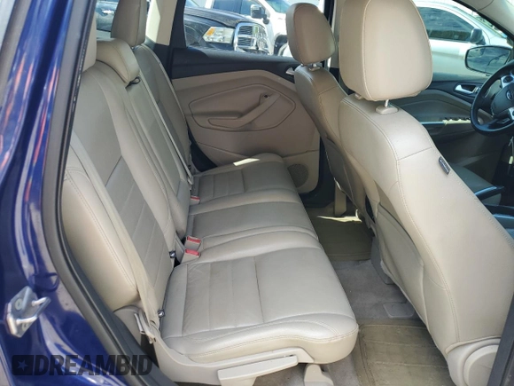 2013 Ford Escape SEL z VIN 1FMCU9HX7DUB98268, wystawiony jako Copart lot #55469915 z przebiegiem 123 619 mil mil oraz Szkoda całkowita • Salvage title. Historia ofert i sprzedaży dostępna na DreamBid. Obrazek 11.