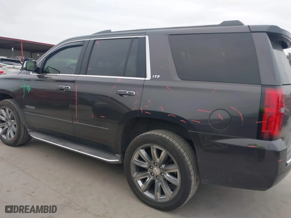 2015 Chevrolet Tahoe LTZ with VIN 1GNSCCKC6FR262769, listed as a IAAI auction lot 41389535 with 196,767 mi miles. Bid and sale history available at carsss.com. Image 14.