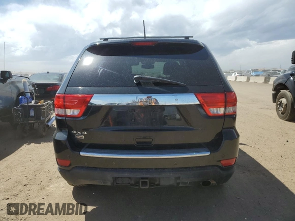 2013 Jeep Grand Cherokee Overland with VIN 1C4RJFCG5DC638927, listed as a Copart auction lot 52752615 with 117,494 mi miles and Salvage Title. Bid and sale history available at carsss.com. Image 6.