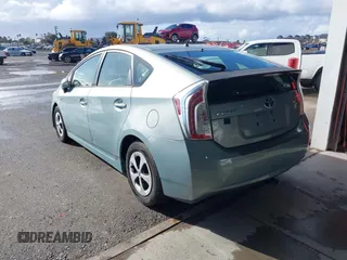 2013 Toyota Prius One with VIN JTDKN3DU6D5557058, listed as a IAAI auction lot 41765281 with 118,128 mi miles. Bid and sale history available at carsss.com. Image 3.