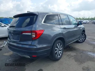 2019 Honda Pilot EX-L with VIN 5FNYF5H52KB039336, listed as a IAAI auction lot 42108456 with 220,307 mi miles and . Bid and sale history available at carsss.com. Image 4.