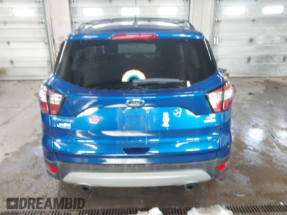 2018 Ford Escape SE z VIN 1FMCU9GD1JUB80500, wystawiony jako IAAI lot #41613294 z przebiegiem 112 187 mil mil oraz . Historia ofert i sprzedaży dostępna na DreamBid. Obrazek 16.
