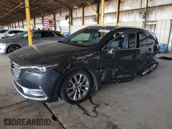 2016 Mazda CX-9 Grand Touring с VIN JM3TCADY3G0119947, выставлен на аукционе Copart как лот 57904515 с пробегом 94 251 миль миль и Списание • Salvage title. История ставок и продаж доступна на DreamBid. Изображение 1.