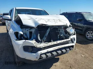 2016 Toyota Tacoma SR5 with VIN 5TFAX5GNXGX073358, listed as a IAAI auction lot 41400235 with 65,672 mi miles and . Bid and sale history available at DreamBid. Image 6.