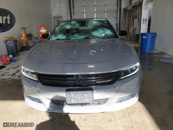 2023 Dodge Charger SXT with VIN 2C3CDXBG2PH587879, listed as a Copart auction lot 54262165 with 60,663 mi miles and Salvage Title. Bid and sale history available at carsss.com. Image 5.