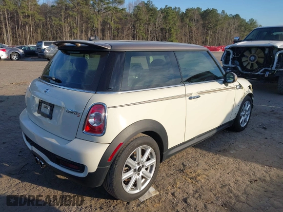 2013 MINI Hardtop S with VIN WMWSV3C53DT479714, listed as a IAAI auction lot 41685283 with 61,904 mi miles and . Bid and sale history available at DreamBid. Image 4.