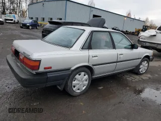 1988 Toyota Camry z VIN JT2VV21E8J0008306, wystawiony jako Copart lot #82378704 z przebiegiem 245 078 mil mil oraz Szkoda całkowita • Salvage title. Historia ofert i sprzedaży dostępna na DreamBid. Obrazek 3.