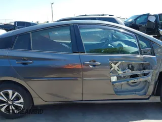 2018 Toyota Prius Plus with VIN JTDKARFP0J3101473, listed as a IAAI auction lot 41857956 with 110,020 mi miles and . Bid and sale history available at DreamBid. Image 14.