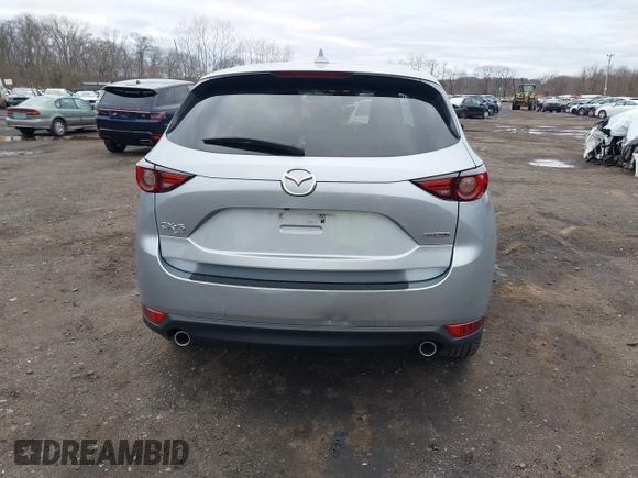2020 Mazda CX-5 Grand Touring with VIN JM3KFBDM4L0843825, listed as a IAAI auction lot 41733575 with 18,800 mi miles. Bid and sale history available at carsss.com. Image 17.