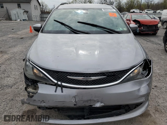 2021 Chrysler Voyager LXi with VIN 2C4RC1DG0MR521145, listed as a Copart auction lot 48062405 with 144,197 mi miles and Salvage Title. Bid and sale history available at DreamBid. Image 5.
