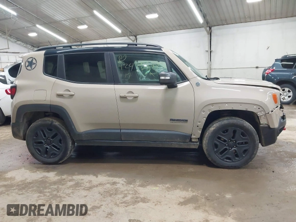 2017 Jeep Renegade Trailhawk z VIN ZACCJBCB6HPE97998, wystawiony jako IAAI lot #42435849 z przebiegiem 105 490 mil mil oraz . Historia ofert i sprzedaży dostępna na DreamBid. Obrazek 13.