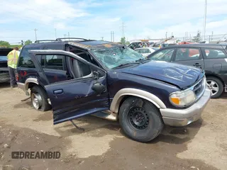 2001 Ford Explorer Eddie Bauer z VIN 1FMZU74E01ZA15102, wystawiony jako IAAI lot #42296412 z przebiegiem 163 954 mil mil oraz . Historia ofert i sprzedaży dostępna na DreamBid. Obrazek 1.
