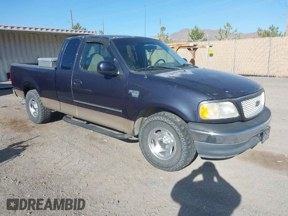 1999 Ford F-150 XL with VIN 1FTRX17L5XKB39130, listed as a IAAI auction lot 42041520 with Not Provided miles. Bid and sale history available at carsss.com. Image 1.