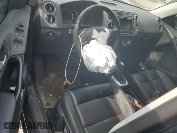2017 Volkswagen Tiguan S with VIN WVGAV7AX8HK038419, listed as a Copart auction lot 53776155 with 72,006 mi miles and Salvage Title. Bid and sale history available at DreamBid. Image 8.
