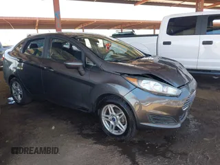 2018 Ford Fiesta SE z VIN 3FADP4BJ1JM115589, wystawiony jako IAAI lot #42222960 z przebiegiem 168 348 mil mil oraz . Historia ofert i sprzedaży dostępna na DreamBid. Obrazek 1.