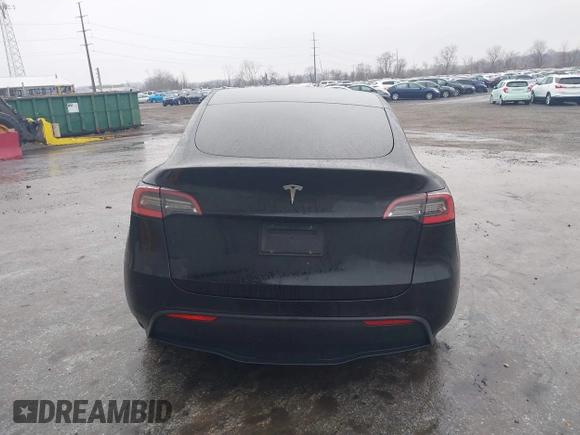 2021 Tesla Model Y Standard Range with VIN 5YJYGDED9MF103989, listed as a IAAI auction lot 41482268 with 33,485 mi miles and . Bid and sale history available at DreamBid. Image 17.