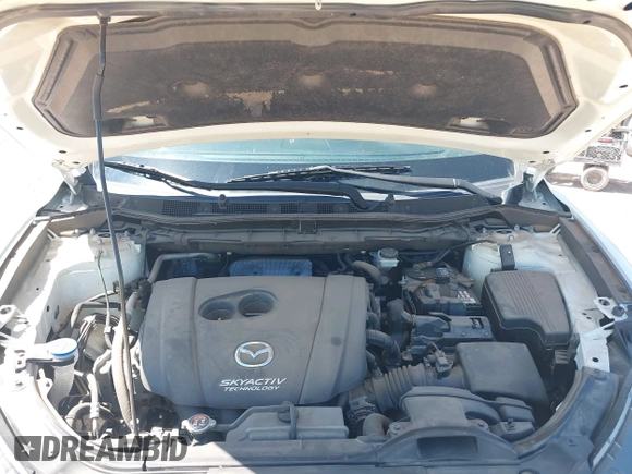 2016 Mazda CX-5 Touring z VIN JM3KE2CY0G0840918, wystawiony jako IAAI lot #42205529 z przebiegiem 74 515 mil mil oraz . Historia ofert i sprzedaży dostępna na DreamBid. Obrazek 10.