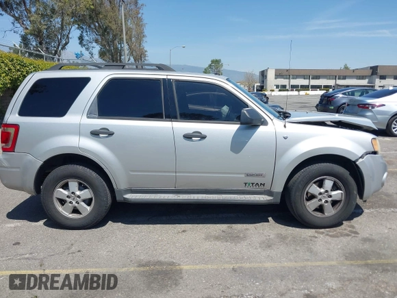 2008 Ford Escape XLT with VIN 1FMCU03168KA77375, listed as a IAAI auction lot 41990755 with 173,455 mi miles and . Bid and sale history available at DreamBid. Image 13.