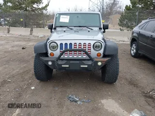 2013 Jeep Wrangler Unlimited Rubicon z VIN 1C4BJWFG7DL667083, wystawiony jako IAAI lot #42016912 z przebiegiem 148 933 mil mil oraz . Historia ofert i sprzedaży dostępna na DreamBid. Obrazek 12.